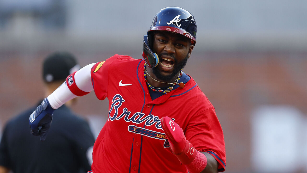 ATLANTA, GEORGIA - JUNE 14: Michael Harris II #23 of the Atlanta Braves reacts as he rounds second on his way to third during the first inning against the Tampa Bay Rays at Truist Park on June 14, 2024 in Atlanta, Georgia.