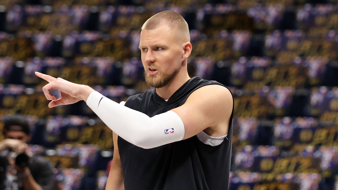 DALLAS, TEXAS - JUNE 14: Kristaps Porzingis #8 of the Boston Celtics warms up prior to Game Four of the 2024 NBA Finals against the Dallas Mavericks at American Airlines Center on June 14, 2024 in Dallas, Texas.