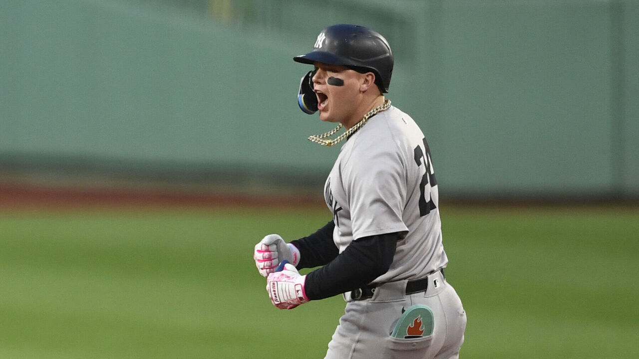 BOSTON, MASSACHUSETTS - JUNE 14: Alex Verdugo #24 of the New York Yankees reacts as he rounds the bases after hitting a two-run home run during the first inning of a game against the Boston Red Sox at Fenway Park on June 14, 2024 in Boston, Massachusetts.