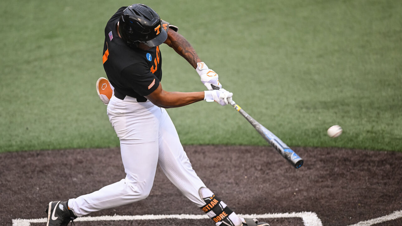 KNOXVILLE, TN - JUNE 09: Tennessee infielder Christian Moore (1) hits a home run during the NCAA Men's Baseball Super Regional game between the Tennessee Volunteers and the Evansville Aces on June 9, 2024, at Lindsey Nelson Stadium in Knoxville, TN.