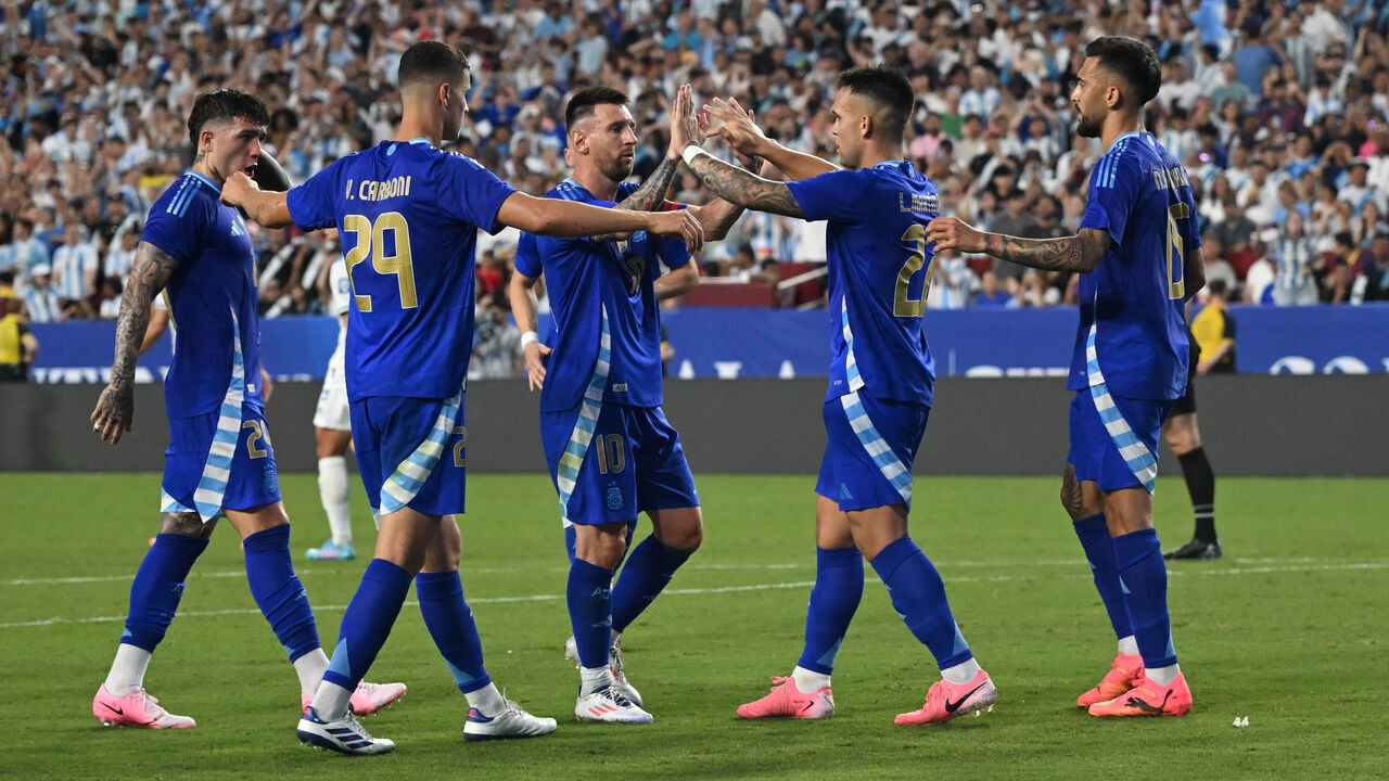 Argentina's forward #10 Lionel Messi (C) and teammates celebrate a goal during the international friendly football match between Guatemala and Argentina at Commanders Field in Greater Landover, Maryland, on June 14, 2024.