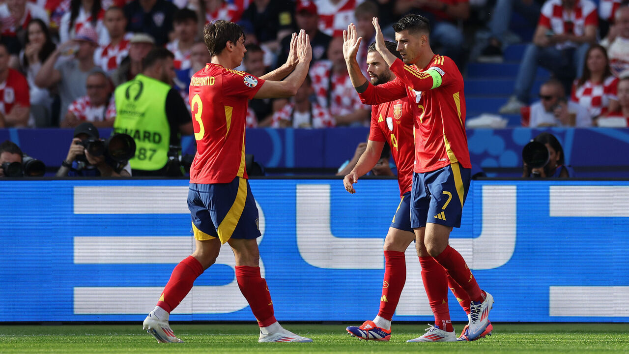 BERLIN, GERMANY - JUNE 15: Alvaro Morata of Spain celebrates scoring his team's first goal with teammate Robin Le Normand of Spain during the UEFA EURO 2024 group stage match between Spain and Croatia at Olympiastadion on June 15, 2024 in Berlin, Germany.