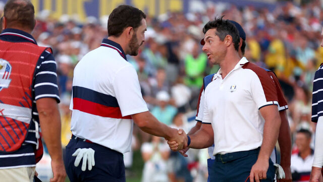 ROME, ITALY - SEPTEMBER 30: Patrick Cantlay of Team United States and Rory McIlroy of Team Europe shake hands on the 18th green during the Saturday afternoon fourball matches of the 2023 Ryder Cup at Marco Simone Golf Club on September 30, 2023 in Rome, Italy.
