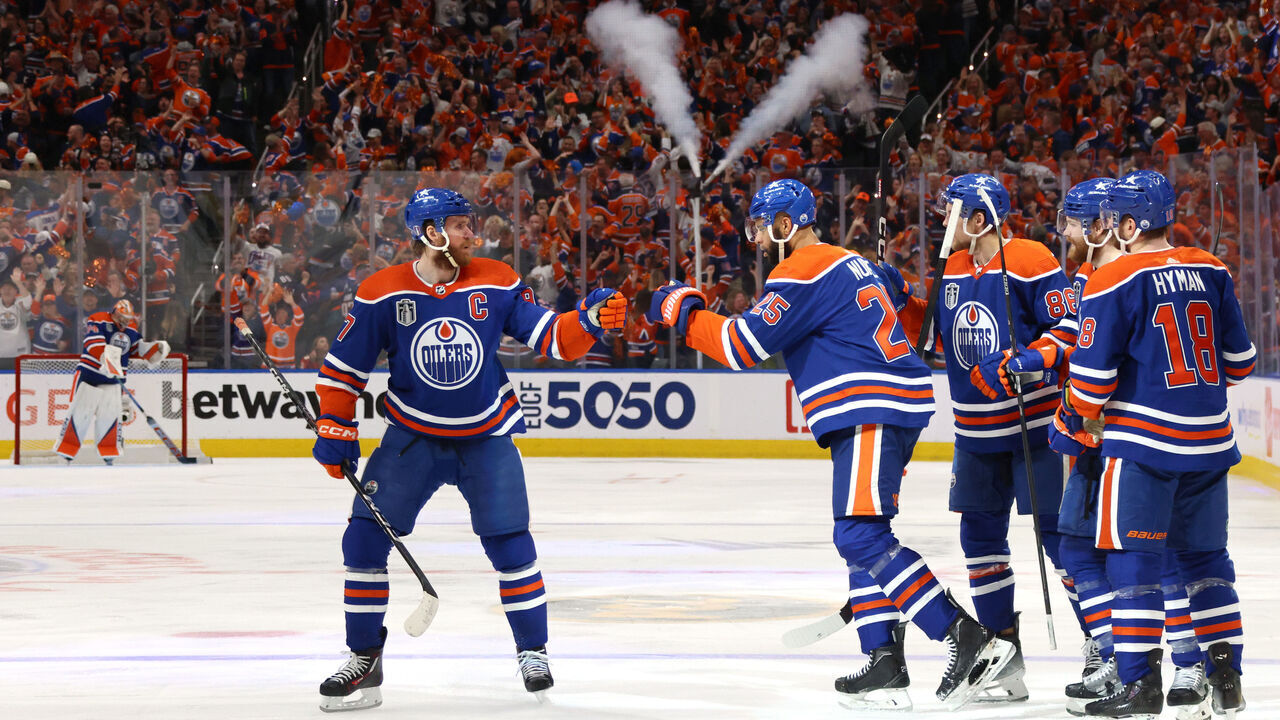 EDMONTON, ALBERTA - JUNE 15: Darnell Nurse #25 of the Edmonton Oilers celebrates with teammates Connor McDavid #97, Zach Hyman #18, Philip Broberg #86 and Warren Foegele #37 after scoring a goal during the second period of Game Four of the 2024 Stanley Cup Final between the Florida Panthers and the Edmonton Oilers at Rogers Place on June 15, 2024 in Edmonton, Alberta.