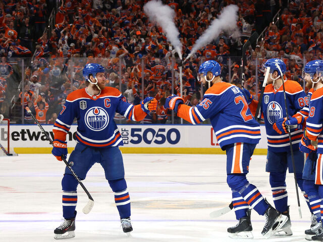 EDMONTON, ALBERTA - JUNE 15: Darnell Nurse #25 of the Edmonton Oilers celebrates with teammates Connor McDavid #97, Zach Hyman #18, Philip Broberg #86 and Warren Foegele #37 after scoring a goal during the second period of Game Four of the 2024 Stanley Cup Final between the Florida Panthers and the Edmonton Oilers at Rogers Place on June 15, 2024 in Edmonton, Alberta.