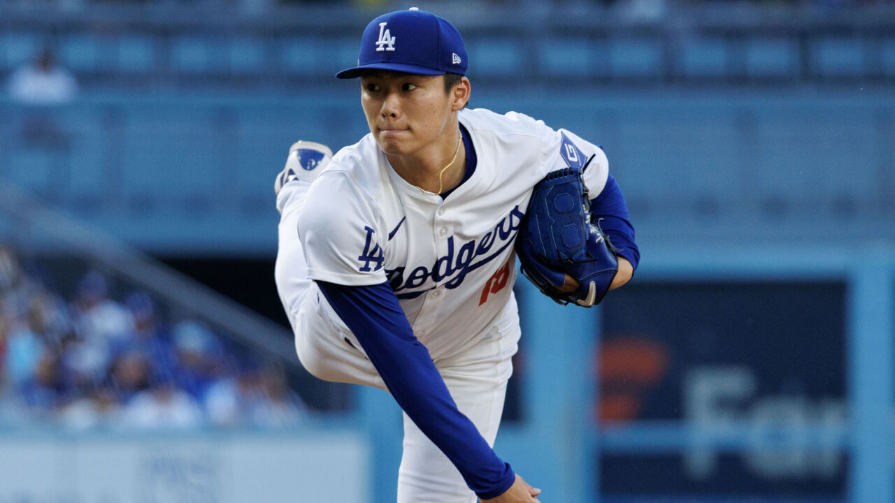 LOS ANGELES, CA - JUNE 15, 2024: Los Angeles Dodgers starting pitcher Yoshinobu Yamamoto (18) throws against the Kansas City Royals in the first inning at Dodger Stadium on June 15, 2024 in Los Angeles, California. He left the game after two innings because of tricep tightness.(Gina Ferazzi / Los Angeles Times via Getty Images)