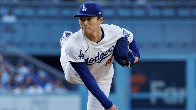 LOS ANGELES, CA - JUNE 15, 2024: Los Angeles Dodgers starting pitcher Yoshinobu Yamamoto (18) throws against the Kansas City Royals in the first inning at Dodger Stadium on June 15, 2024 in Los Angeles, California. He left the game after two innings because of tricep tightness.(Gina Ferazzi / Los Angeles Times via Getty Images)