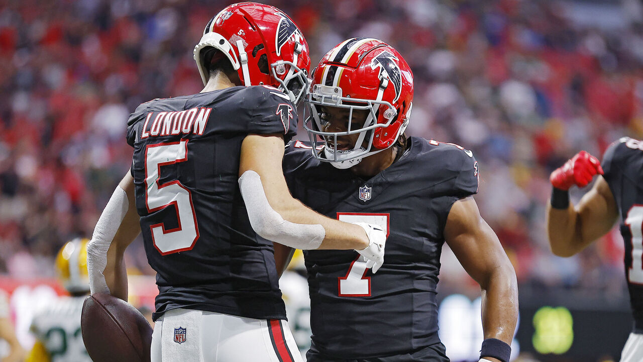 ATLANTA, GEORGIA - SEPTEMBER 17: Drake London #5 of the Atlanta Falcons and Bijan Robinson #7 celebrate a touchdown during the second quarter in the game against the Green Bay Packers at Mercedes-Benz Stadium on September 17, 2023 in Atlanta, Georgia.