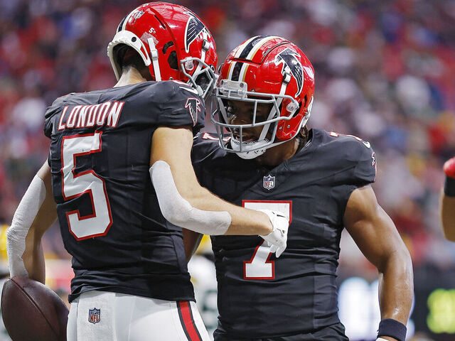 ATLANTA, GEORGIA - SEPTEMBER 17: Drake London #5 of the Atlanta Falcons and Bijan Robinson #7 celebrate a touchdown during the second quarter in the game against the Green Bay Packers at Mercedes-Benz Stadium on September 17, 2023 in Atlanta, Georgia.