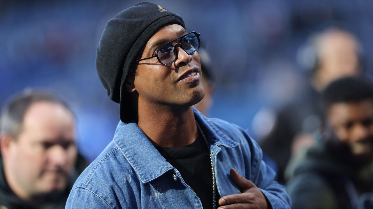 PARIS, FRANCE - APRIL 10: Ronaldinho Gaucho, former Brazilian football player, looks on prior to the UEFA Champions League quarter-final first leg match between Paris Saint-Germain and FC Barcelona at Parc des Princes on April 10, 2024 in Paris, France.