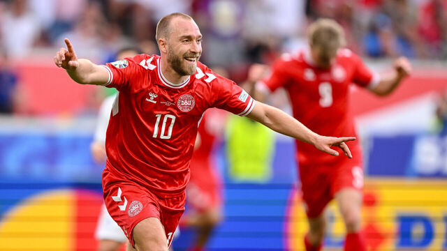 STUTTGART, GERMANY - JUNE 16: Christian Eriksen of Denmark celebrates after scoring his team's first goal with teammates during the UEFA EURO 2024 group stage match between Slovenia and Denmark at Stuttgart Arena on June 16, 2024 in Stuttgart, Germany.