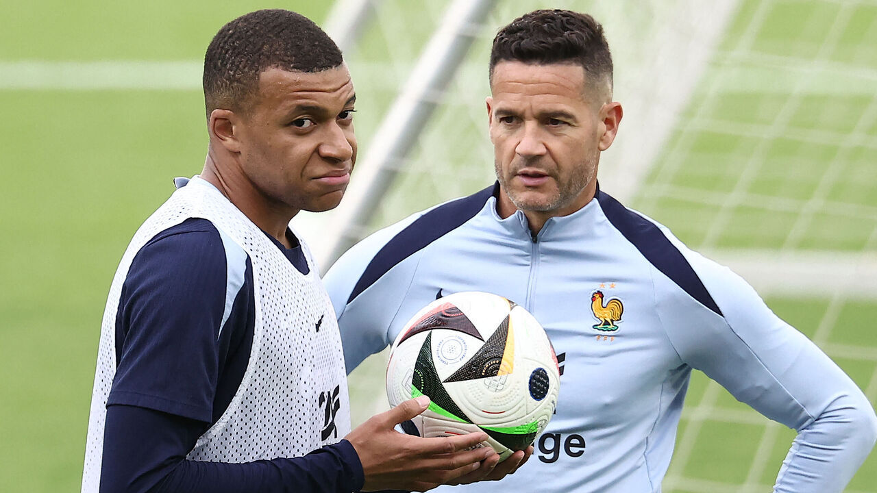 France's forward #10 Kylian Mbappe reacts during a training session ahead of the UEFA Euro 2024 football Championship at the Home Deluxe Arena Stadium in Paderborn, western Germany, on June 12, 2024.
