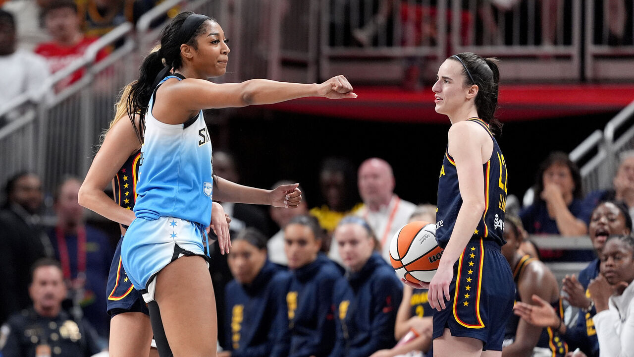 INDIANAPOLIS, INDIANA - JUNE 16: Angel Reese #5 of the Chicago Sky reacts after fouling Caitlin Clark #22 of the Indiana Fever during the second half at Gainbridge Fieldhouse on June 16, 2024 in Indianapolis, Indiana.
