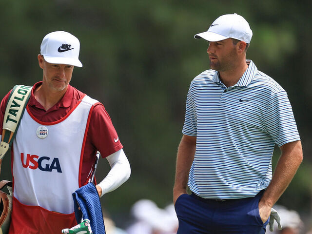PINEHURST, NORTH CAROLINA - JUNE 16: Tom McKibbin of Northern Ireland and his playing partner Scottie Scheffler of The United States wait to play on the seventh hole during the final round of the 2024 U.S. Open Championship on the No.2 Course at The Pinehurst Resort on June 16, 2024 in Pinehurst, North Carolina.