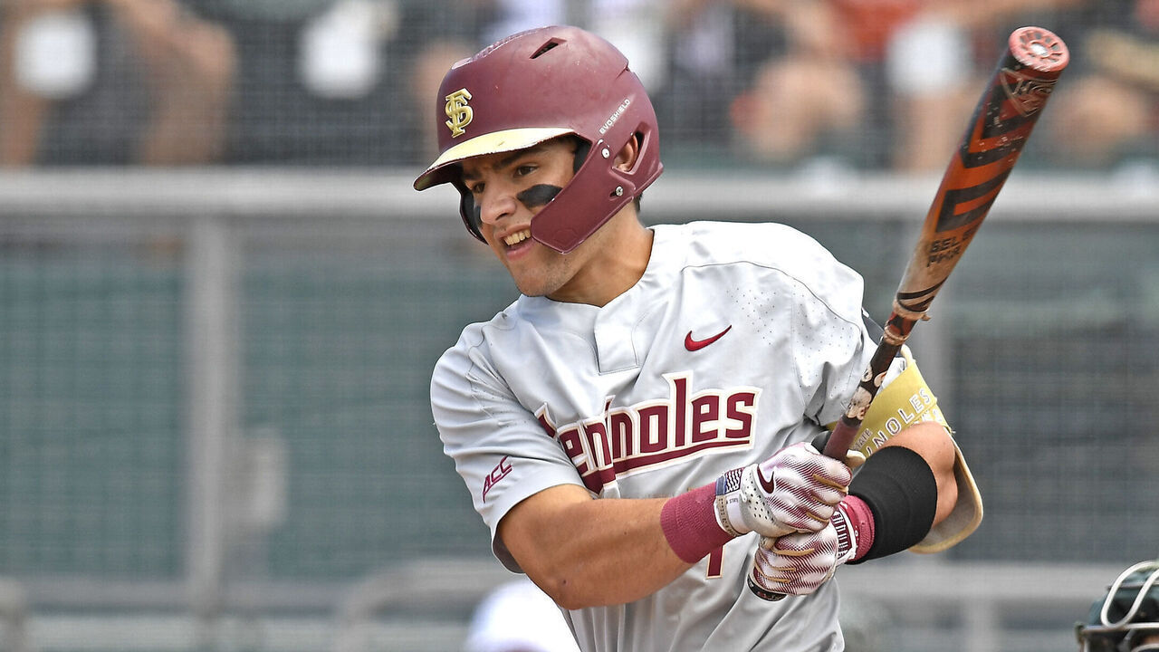 CORAL GABLES, FL - APR 01: FSU outfielder Jaime Ferrer (7) hits in the second inning as the Miami Hurricanes faced the Florida State Seminoles on April 1, 2023, at Mark Light Field at Alex Rodriguez Park in Coral Gables, Florida.