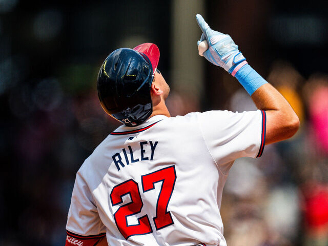 ATLANTA, GA - JUNE 16: Austin Riley #27 of the Atlanta Braves celebrates after hitting a a home run in the eighth inning against the Tampa Bay Rays at Truist Park on June 16, 2024 in Atlanta, Georgia.