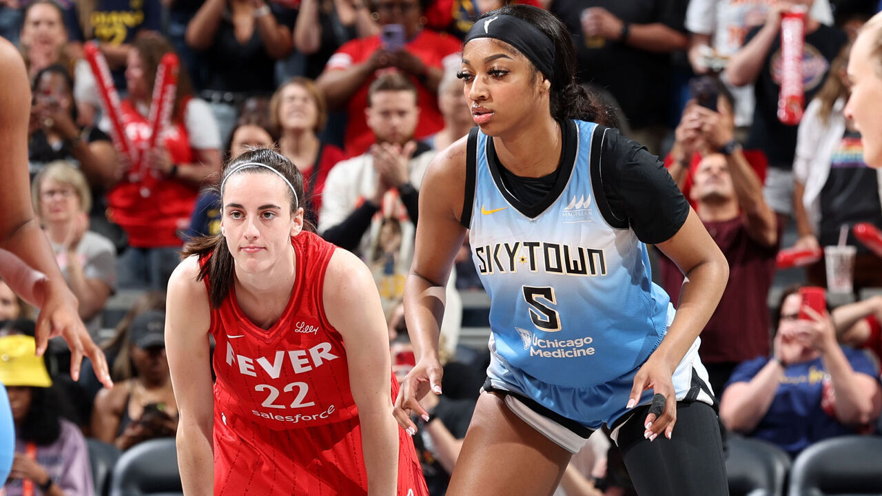 INDIANAPOLIS, IN - JUNE 1: Caitlin Clark #22 of the Indiana Fever and Angel Reese #5 of the Chicago Sky look on during the game on June 1, 2024 at Gainbridge Fieldhouse in Indianapolis, Indiana. Mandatory Copyright Notice: Copyright 2024 NBAE