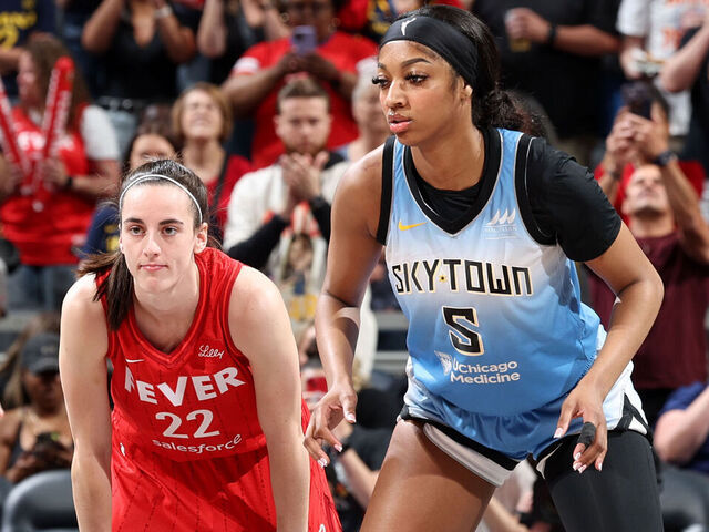 INDIANAPOLIS, IN - JUNE 1: Caitlin Clark #22 of the Indiana Fever and Angel Reese #5 of the Chicago Sky look on during the game on June 1, 2024 at Gainbridge Fieldhouse in Indianapolis, Indiana. Mandatory Copyright Notice: Copyright 2024 NBAE