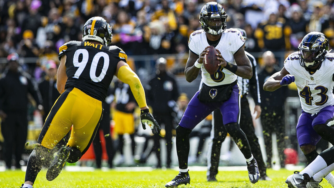 PITTSBURGH, PA - OCTOBER 08: Pittsburgh Steelers linebacker T.J. Watt (90) rushes Baltimore Ravens quarterback Lamar Jackson (8) during the regular season NFL football game between the Baltimore Ravens and Pittsburgh Steelers on October 08, 2023 at Acrisure Stadium in Pittsburgh, PA.