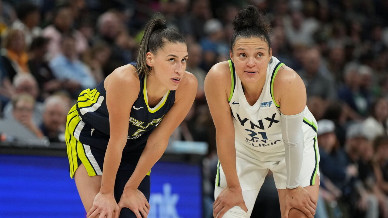 MINNEAPOLIS, MN - JUNE 17: Sevgi Uzun #1 of the Dallas Wings and Kayla McBride #21 of the Minnesota Lynx look on during the game on June 17, 2024 at Target Center in Minneapolis, Minnesota. Mandatory Copyright Notice: Copyright 2024 NBAE