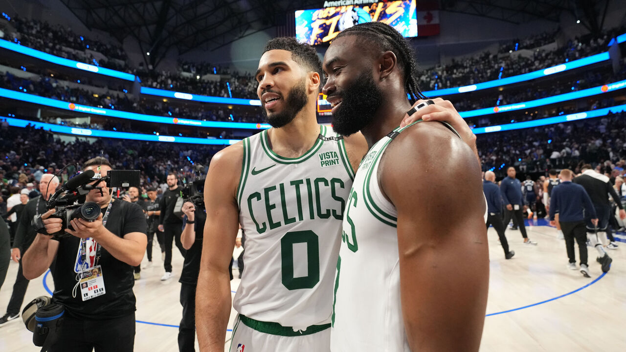 DALLAS, TX - JUNE 12: Jayson Tatum #0 and Jaylen Brown #7 of the Boston Celtics smile after the game against the Dallas Mavericks during Game 3 of the 2024 NBA Finals on June 12, 2024 at the American Airlines Center in Dallas, Texas. Mandatory Copyright Notice: Copyright 2024 NBAE