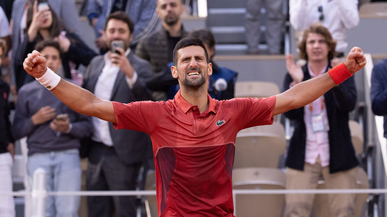 PARIS, FRANCE - JUNE 03: Novak Djokovic of Serbia celebrates to the crowd after his victory against Francisco Cerundolo of Argentina in the Men's Singles fourth round match during Day Nine of the 2024 French Open at Roland Garros on June 03, 2024 in Paris, France.