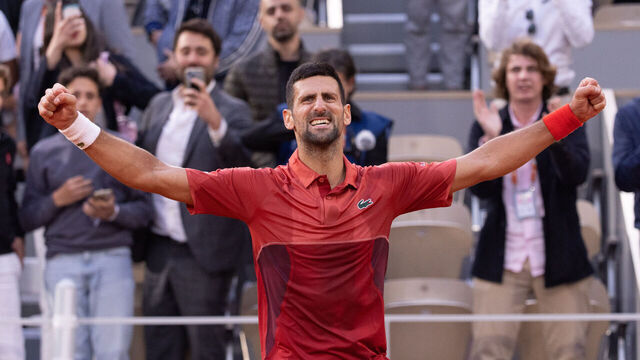 PARIS, FRANCE - JUNE 03: Novak Djokovic of Serbia celebrates to the crowd after his victory against Francisco Cerundolo of Argentina in the Men's Singles fourth round match during Day Nine of the 2024 French Open at Roland Garros on June 03, 2024 in Paris, France.