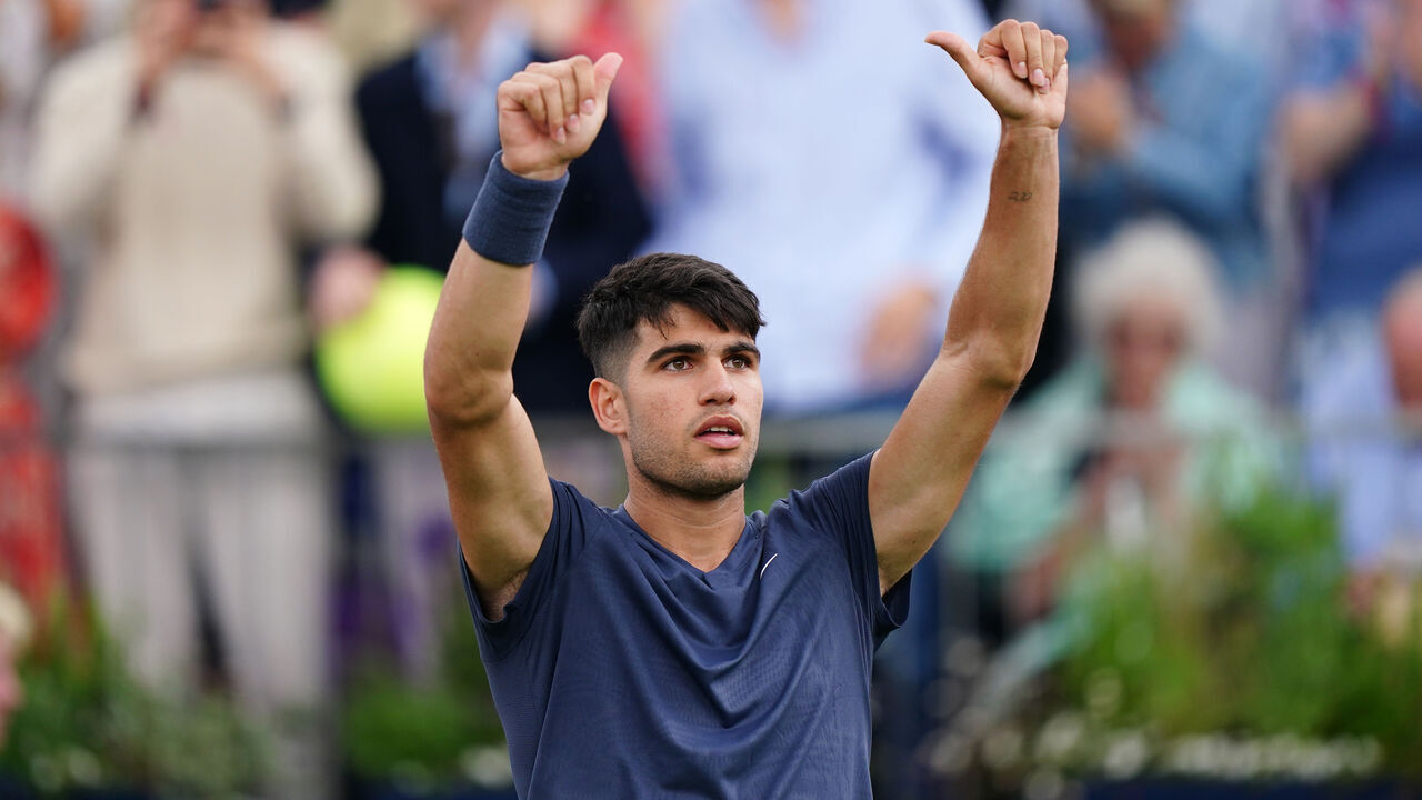 Carlos Alcaraz celebrates victory against Francisco Cerundolo after their men's singles match on day four of the cinch Championships at The Queen's Club, London. Picture date: Tuesday June 18, 2024.