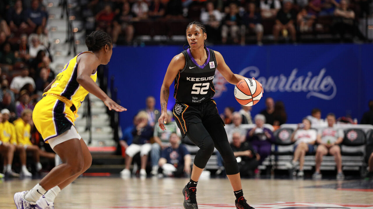 UNCASVILLE, CT - JUNE 18: Tyasha Harris #52 of the Connecticut Sun dribbles the ball during the game against the Los Angeles Sparks on June 18, 2024 at the Mohegan Sun Arena in Uncasville, Connecticut. Mandatory Copyright Notice: Copyright 2024 NBAE