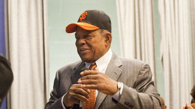 NEW YORK - JANURARY 21: Willie Mays, center, visits PS 46 in Harlem, next to the site of the former Polo Grounds, where the new York Giants played before moving to San Francisco in 1958, on Jan. 21, 2011 in New York City. The Giants hadn't won the World Series since 1954.