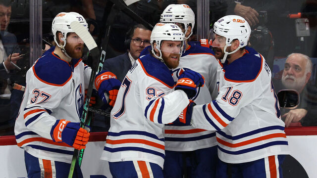 SUNRISE, FLORIDA - JUNE 18: Connor McDavid #97 of the Edmonton Oilers celebrates with teammates after scoring a goal during the second period against the Florida Panthers in Game Five of the 2024 Stanley Cup Final at Amerant Bank Arena on June 18, 2024 in Sunrise, Florida.