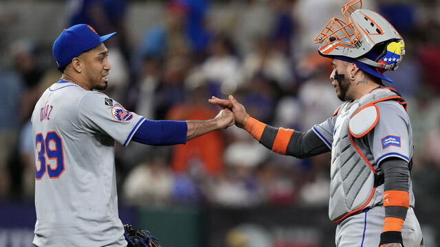 ARLINGTON, TEXAS - JUNE 18: Edwin Díaz #39 and Francisco Alvarez #4 of the New York Mets celebrate after defeating the against the Texas Rangers at Globe Life Field on June 18, 2024 in Arlington, Texas.