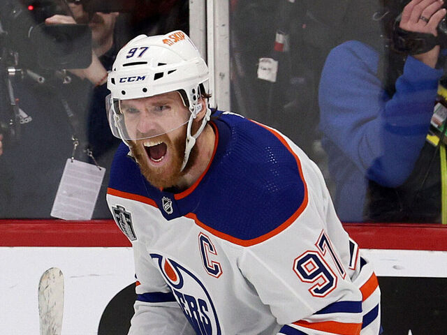 SUNRISE, FLORIDA - JUNE 18: Connor McDavid #97 of the Edmonton Oilers reacts after scoring an empty net goal during the third period against the Florida Panthers in Game Five of the 2024 Stanley Cup Final at Amerant Bank Arena on June 18, 2024 in Sunrise, Florida.