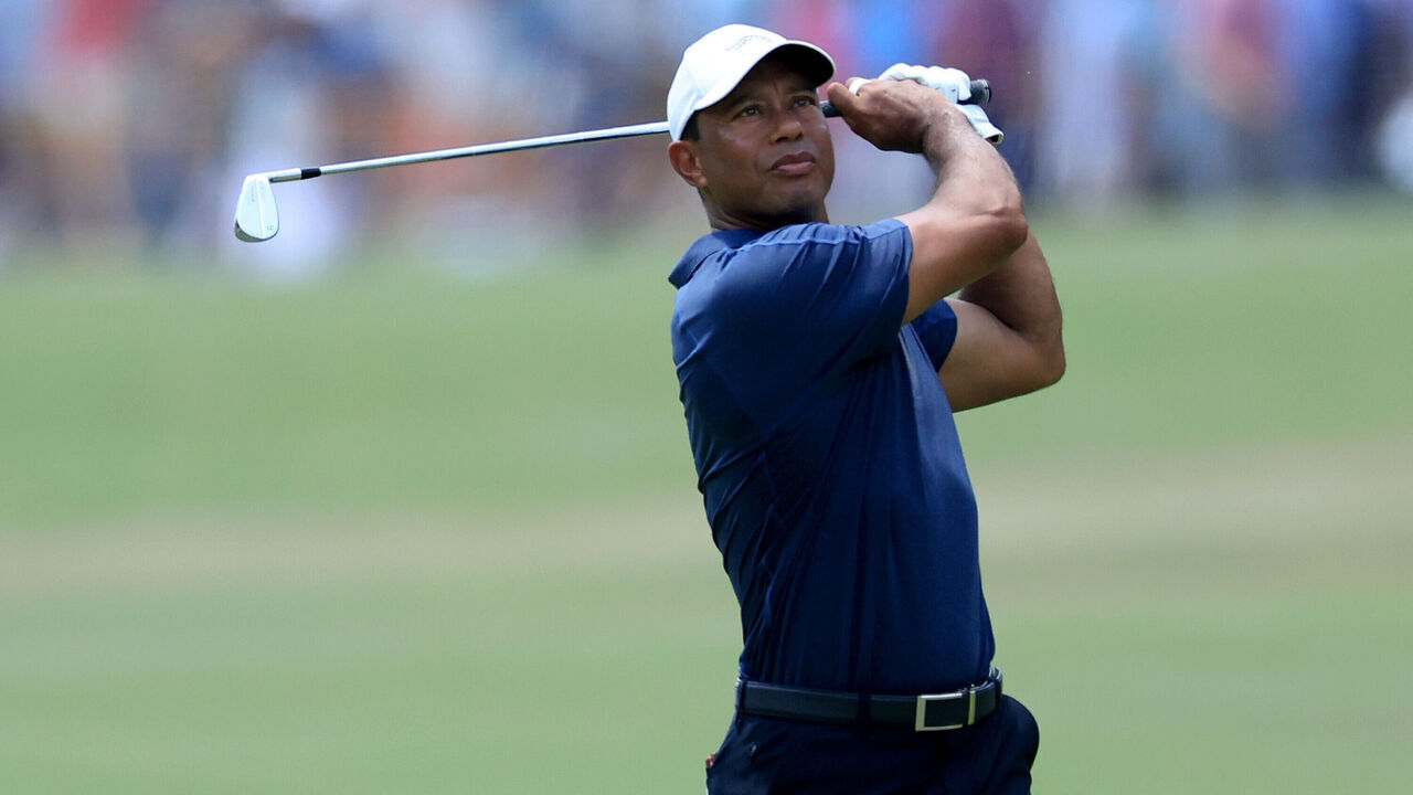 PINEHURST, NORTH CAROLINA - JUNE 14: Tiger Woods of The United States plays his second shot on the first hole during the second round of the 2024 U.S. Open on The No.2 Course at The Pinehurst Resort on June 14, 2024 in Pinehurst, North Carolina.