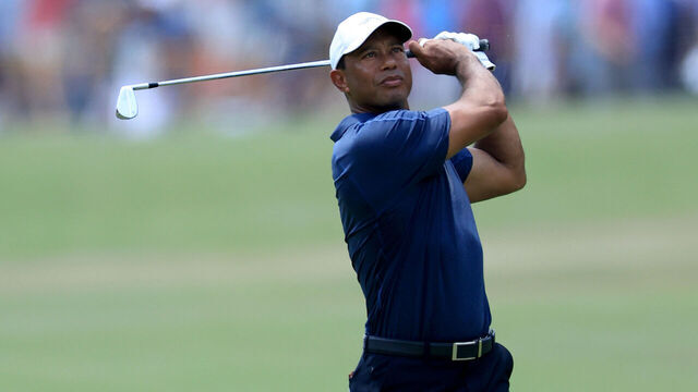 PINEHURST, NORTH CAROLINA - JUNE 14: Tiger Woods of The United States plays his second shot on the first hole during the second round of the 2024 U.S. Open on The No.2 Course at The Pinehurst Resort on June 14, 2024 in Pinehurst, North Carolina.