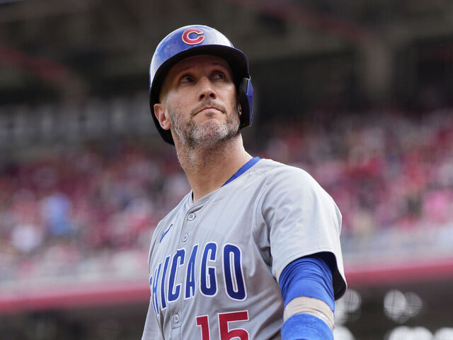 CINCINNATI, OHIO - JUNE 08: Yan Gomes #15 of the Chicago Cubs warms up in the batter's box during a baseball game against the Cincinnati Reds at Great American Ball Park on June 08, 2024 in Cincinnati, Ohio.