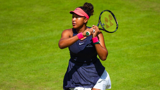 BERLIN, GERMANY - JUNE 18: Naomi Osaka of Japan in action against Qinwen Zheng of China in the first round on Day 2 of the Ecotrans Ladies Open Berlin on June 18, 2024 in Berlin, Germany