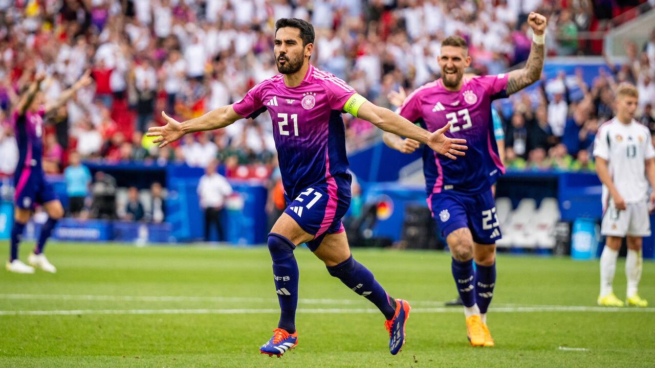 STUTTGART, GERMANY - JUNE 19: Ilkay Guendogan of Germany celebrates with teammate Robert Andrich of Germany after scoring his team's second goal during the UEFA EURO 2024 group stage match between Germany and Hungary at Stuttgart Arena on June 19, 2024 in Stuttgart, Germany.