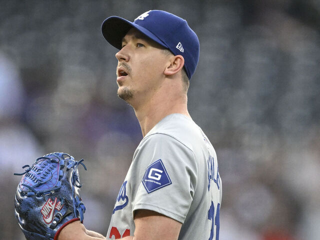 DENVER, CO - JUNE 18: Walker Buehler (21) of the Los Angeles Dodgers works against the Colorado Rockies during the first inning at Coors Field in Denver on Tuesday, June 18, 2024.