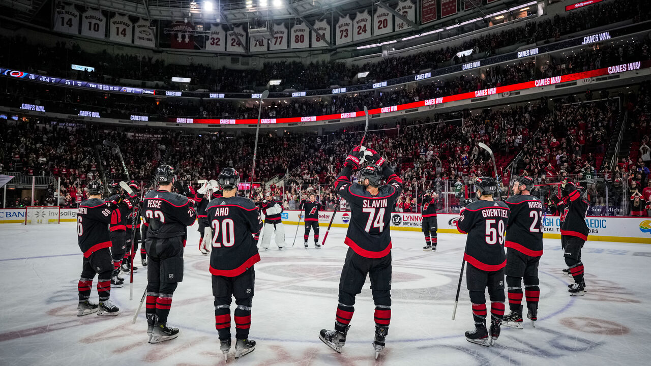 RALEIGH, NORTH CAROLINA - APRIL 07: The Carolina Hurricanes celebrate with a Storm Surge after a 3-0 victory against the Columbus Blue Jackets at PNC Arena on April 7, 2024 in Raleigh, North Carolina.