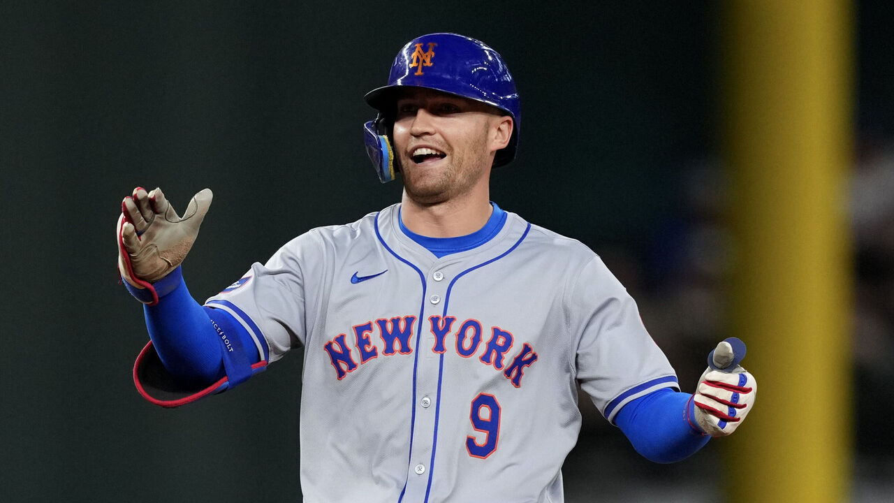 ARLINGTON, TEXAS - JUNE 19: Brandon Nimmo #9 of the New York Mets celebrates after hitting a double during the fourth inning against the Texas Rangers at Globe Life Field on June 19, 2024 in Arlington, Texas.