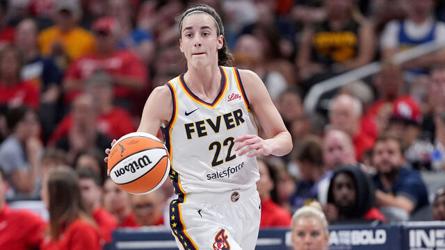 INDIANAPOLIS, INDIANA - JUNE 19: Caitlin Clark #22 of the Indiana Fever brings the ball up court during the first half of a game against the Washington Mystics at Gainbridge Fieldhouse on June 19, 2024 in Indianapolis, Indiana.