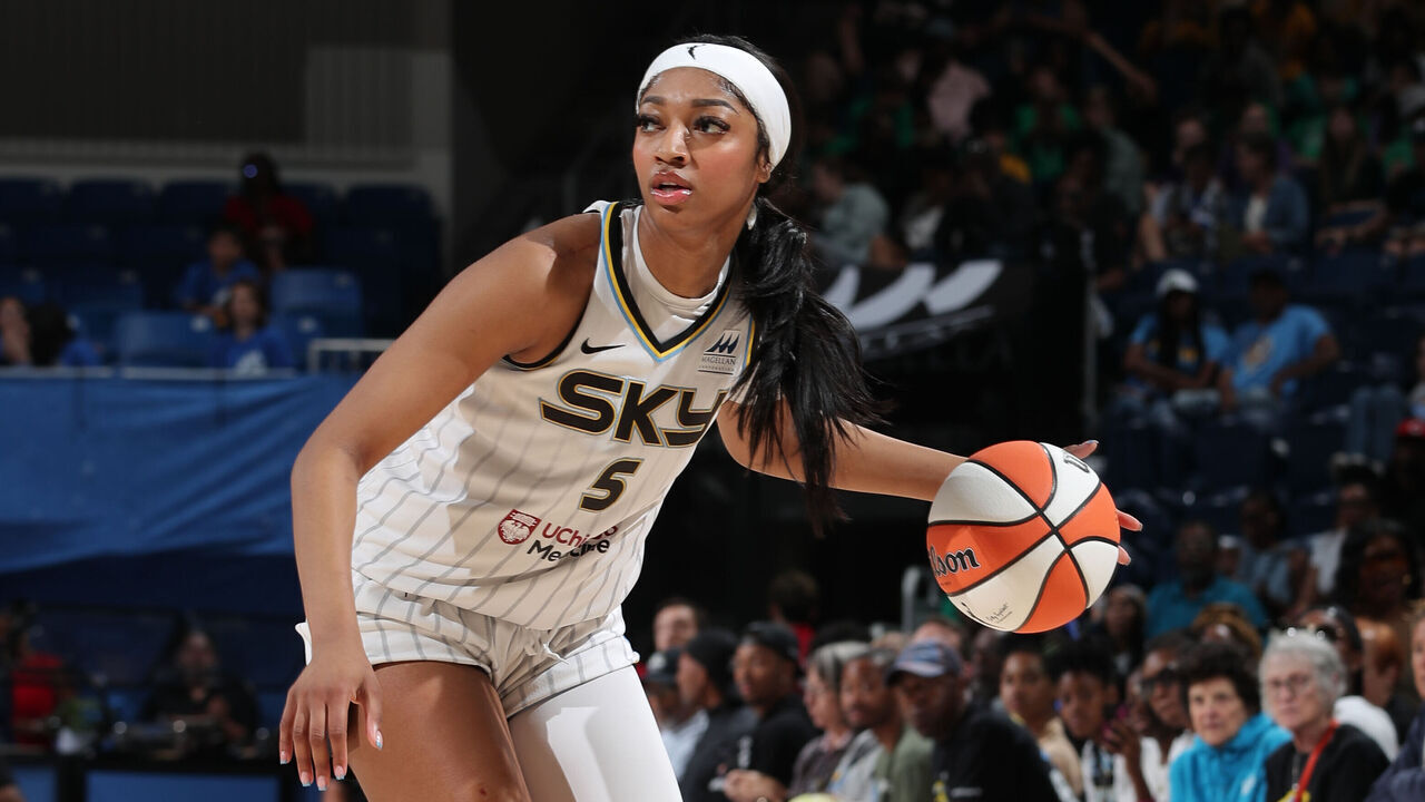 CHICAGO, IL - JUNE 20: Angel Reese #5 of the Chicago Sky dribbles the ball during the game against the Dallas Wings on June 20, 2024 at the Wintrust Arena in Chicago, IL. Mandatory Copyright Notice: Copyright 2024 NBAE