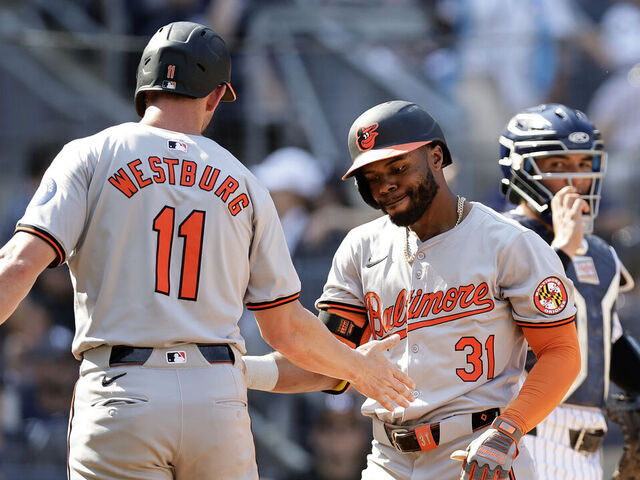 NEW YORK, NEW YORK - JUNE 20: Cedric Mullins #31 of the Baltimore Orioles celebrates his second inning two-run home run against the New York Yankees with Jordan Westburg #11 at Yankee Stadium on June 20, 2024 in New York City.