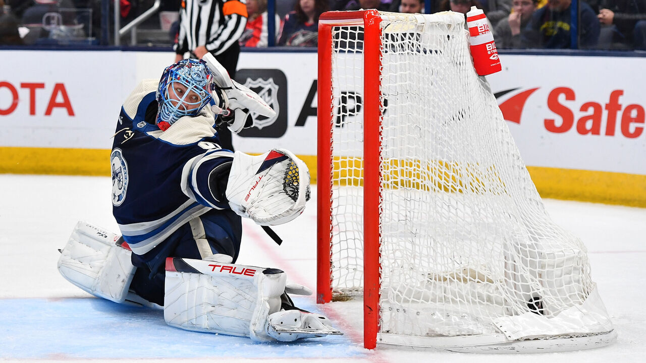 COLUMBUS, OHIO - MARCH 30: Goaltender Elvis Merzlikins #90 of the Columbus Blue Jackets fails to stop a shot during the second period of a game against the Pittsburgh Penguins at Nationwide Arena on March 30, 2024 in Columbus, Ohio.