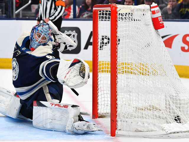 COLUMBUS, OHIO - MARCH 30: Goaltender Elvis Merzlikins #90 of the Columbus Blue Jackets fails to stop a shot during the second period of a game against the Pittsburgh Penguins at Nationwide Arena on March 30, 2024 in Columbus, Ohio.