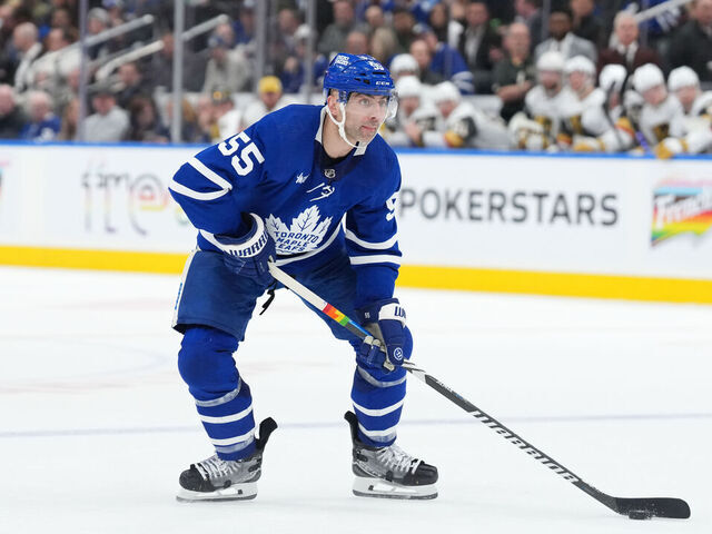 TORONTO, ON - FEBRUARY 27: Toronto Maple Leafs defenseman Mark Giordano (55) holds the puck along the blue line during the second period of the NHL regular season game between the Las Vegas Golden Knights and the Toronto Maple Leafs on February 27, 2024 at Scotiabank Arena in Toronto, ON.