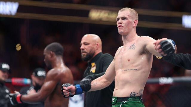 ANAHEIM, CALIFORNIA - FEBRUARY 17: Ian Garry of Ireland celebrates defeating Geoff Neal by split decision in their welterweight fight during UFC 298 at Honda Center on February 17, 2024 in Anaheim, California.