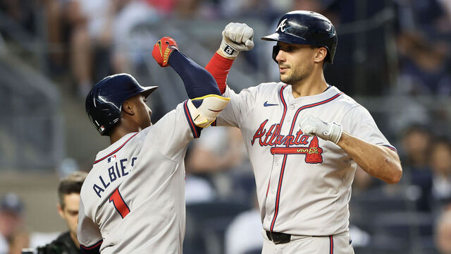 NEW YORK, NEW YORK - JUNE 21: Ozzie Albies #1 reacts with Matt Olson #28 of the Atlanta Braves against the New York Yankees during the fourth inning at Yankee Stadium on June 21, 2024 in the Bronx borough of New York City.