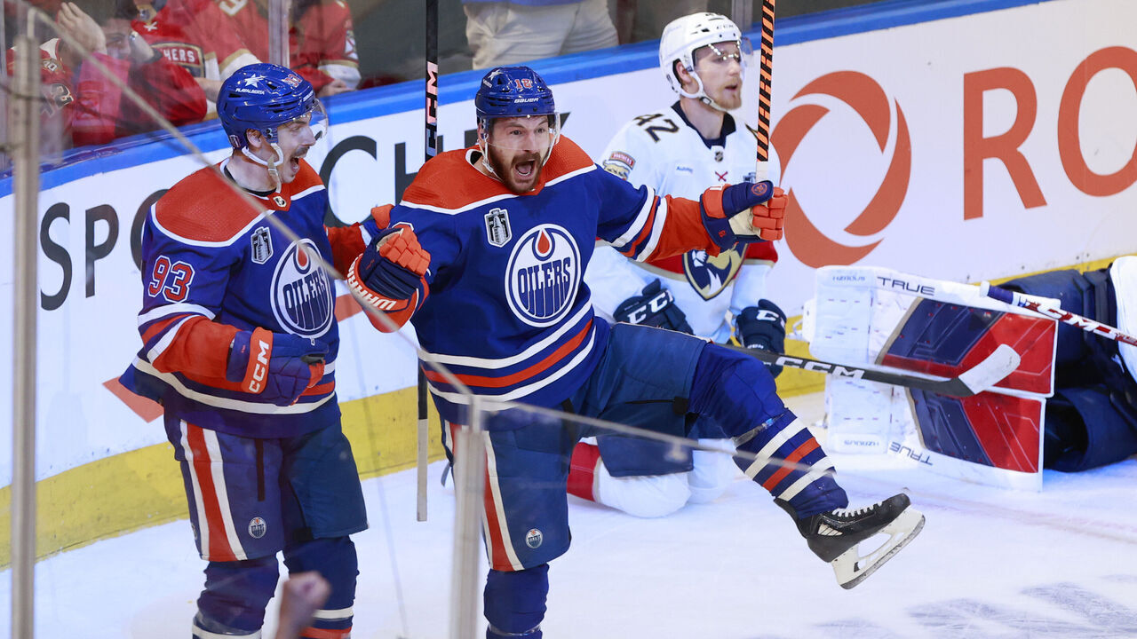 EDMONTON, ALBERTA - JUNE 21: Ryan Nugent-Hopkins #93 and Zach Hyman #18 of the Edmonton Oilers celebrate after Hyman's goal against the Florida Panthers during the second period of Game Six of the 2024 Stanley Cup Final at Rogers Place on June 21, 2024 in Edmonton, Alberta.